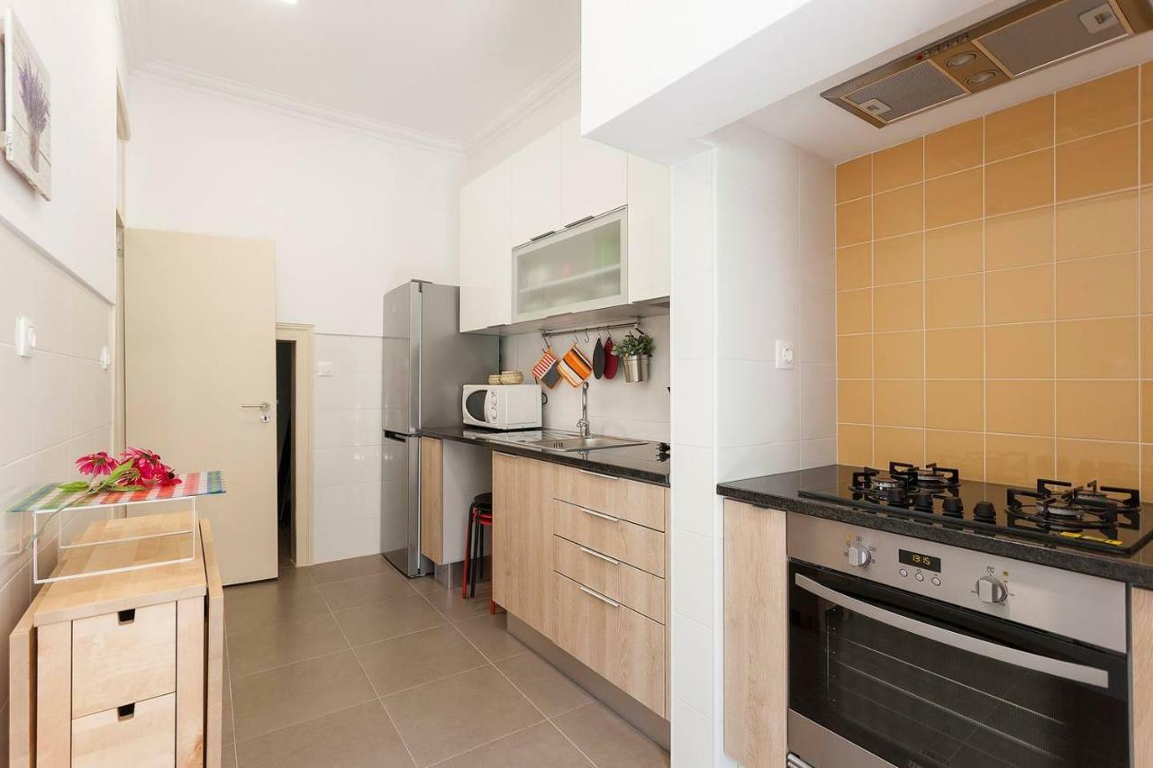 Sunny Orange Garden Apartment In Central Лиссабон Экстерьер фото